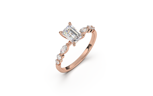 טבעת משובצת יהלום מרכזי אמרלד ואבני צד מרקיזות ועגולות